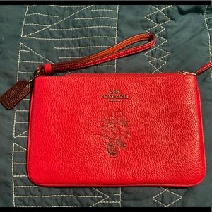 Coach Disney Minnie Mouse wristlet